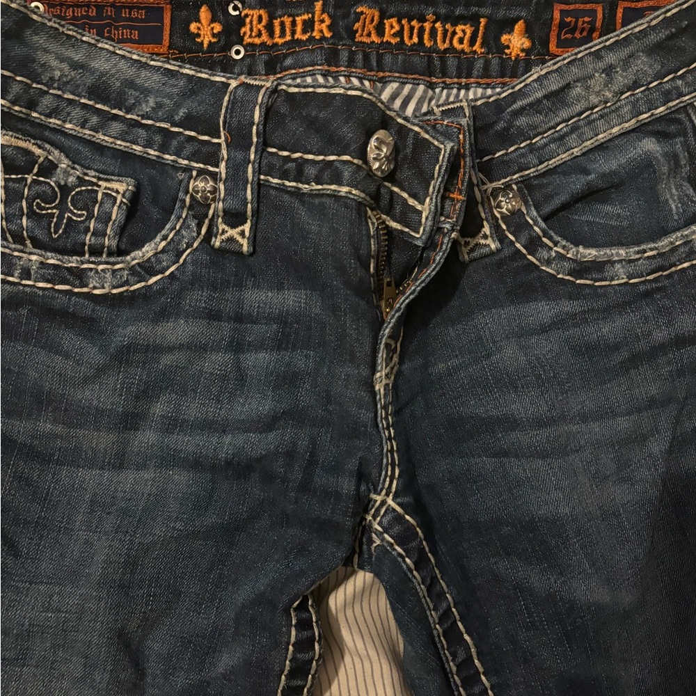 Rock Revival Blue Jeans with Contrast Stitching and Distressed Finish